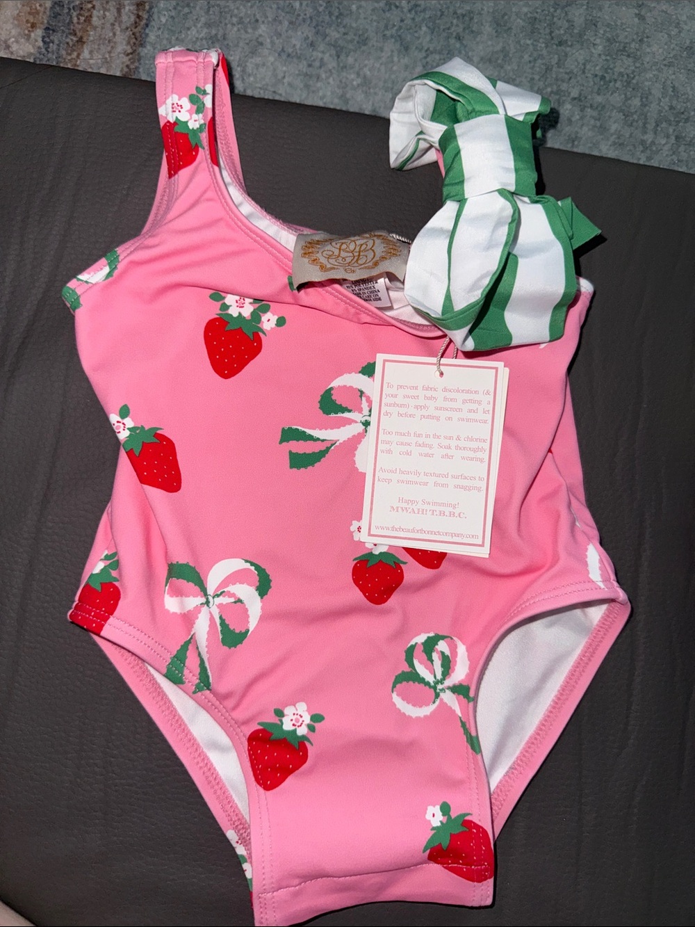 The Beaufort Bonnet Company Pink Strawberry Print One-Piece with Green Bow